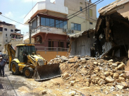 بالصور: جرافات البلدية تهدم روضة الأطفال في شارع هتبواح بمدينة يافا 